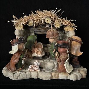 Traditional Nativity Scene with Green and Brown Details